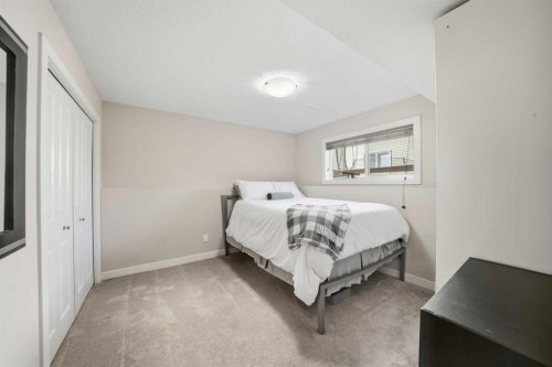 22 Mackenzie Ranch Way, Lacombe, AB - Indoor Photo Showing Bedroom