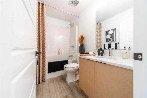 202 Sora Way Se, Calgary, AB - Indoor Photo Showing Bathroom
