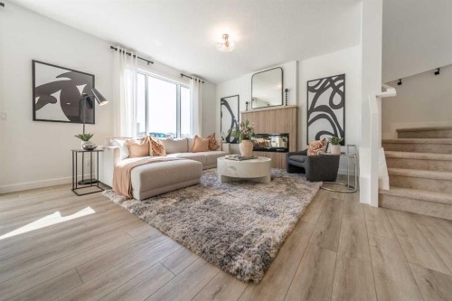 202 Sora Way Se, Calgary, AB - Indoor Photo Showing Living Room