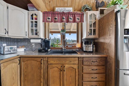 3-32460 Range Road 61, Rural Mountain View County, AB - Indoor Photo Showing Kitchen With Double Sink
