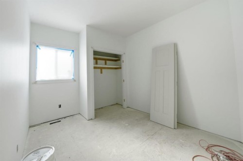 8 Henner'S Place, Lacombe, AB - Indoor Photo Showing Other Room