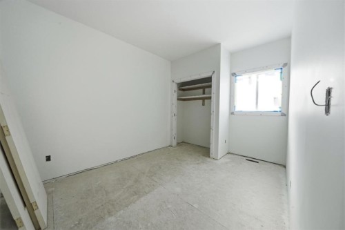 8 Henner'S Place, Lacombe, AB - Indoor Photo Showing Other Room