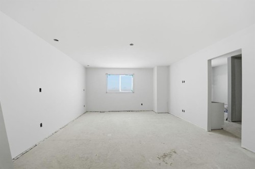 8 Henner'S Place, Lacombe, AB - Indoor Photo Showing Other Room