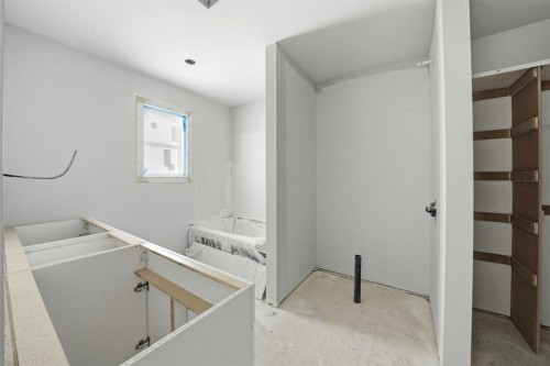 8 Henner'S Place, Lacombe, AB - Indoor Photo Showing Other Room