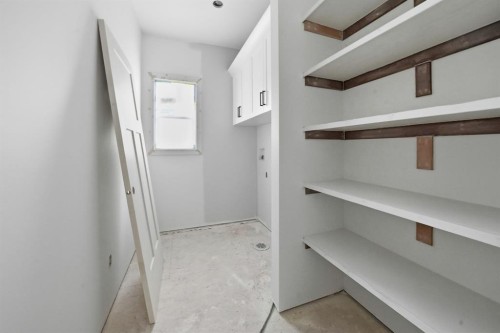 8 Henner'S Place, Lacombe, AB - Indoor With Storage
