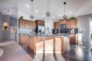 13 Heritage Drive, Penhold, AB  - Indoor Photo Showing Kitchen With Upgraded Kitchen 