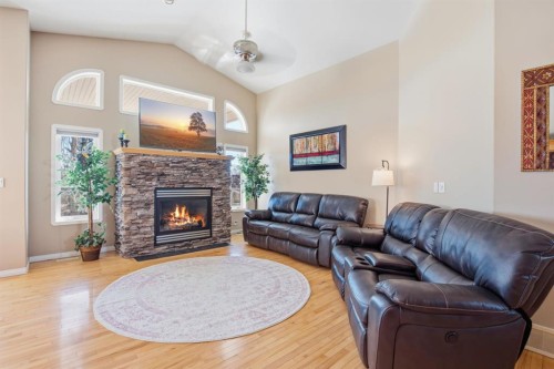 58 Lewis Close, Red Deer, AB - Indoor Photo Showing Living Room With Fireplace