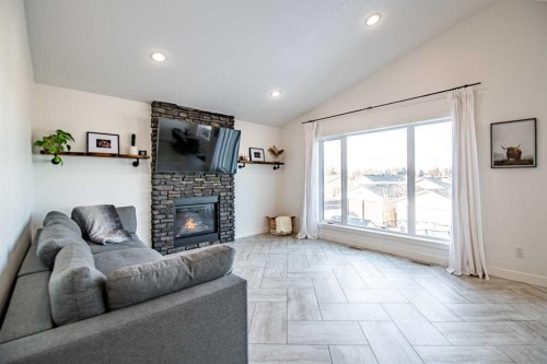 53 Portway Close, Blackfalds, AB - Indoor Photo Showing Living Room With Fireplace