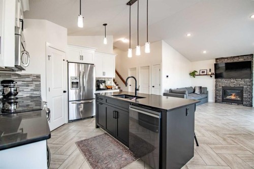 53 Portway Close, Blackfalds, AB - Indoor Photo Showing Kitchen With Fireplace With Stainless Steel Kitchen With Double Sink With Upgraded Kitchen