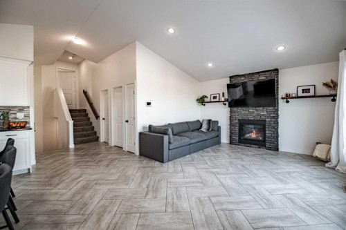 53 Portway Close, Blackfalds, AB - Indoor Photo Showing Living Room With Fireplace