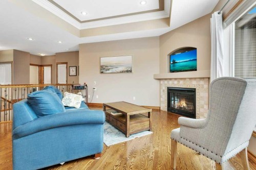 134 Lougheed Close, Red Deer, AB - Indoor Photo Showing Living Room With Fireplace