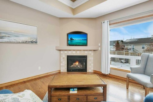 134 Lougheed Close, Red Deer, AB - Indoor Photo Showing Living Room With Fireplace