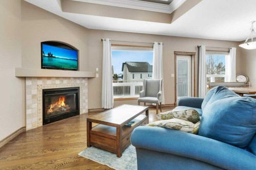 134 Lougheed Close, Red Deer, AB - Indoor Photo Showing Living Room With Fireplace