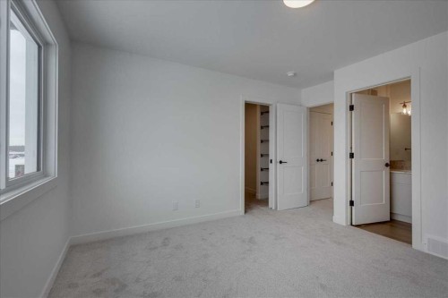 32 Inglis Crescent, Sylvan Lake, AB - Indoor Photo Showing Other Room