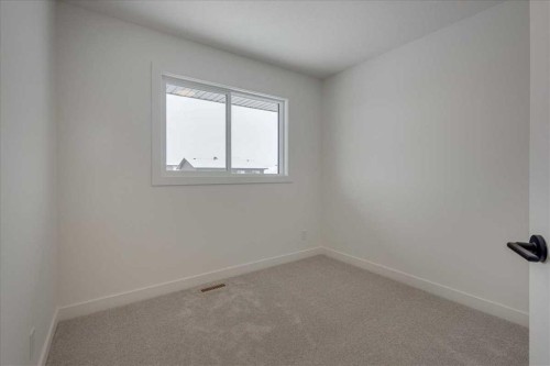 32 Inglis Crescent, Sylvan Lake, AB - Indoor Photo Showing Other Room