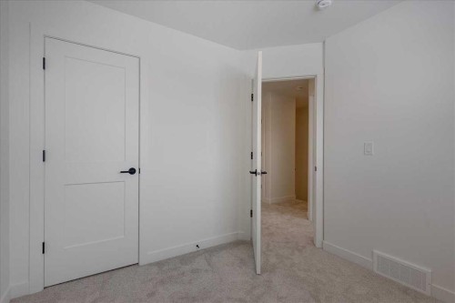 32 Inglis Crescent, Sylvan Lake, AB - Indoor Photo Showing Other Room