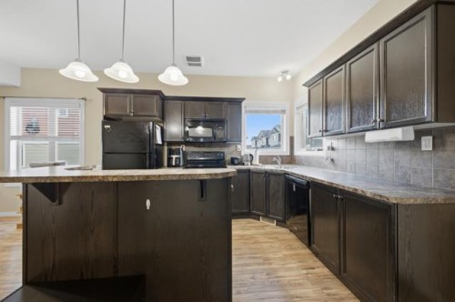 408-150 Vanier Drive, Red Deer, AB - Indoor Photo Showing Kitchen With Upgraded Kitchen