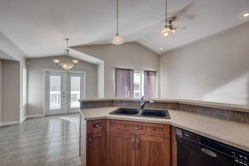 9 Assinger Avenue, Red Deer, AB - Indoor Photo Showing Kitchen With Double Sink