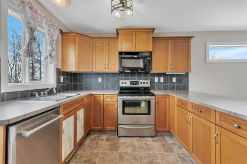 165 Kelloway Crescent, Red Deer, AB - Indoor Photo Showing Kitchen With Double Sink