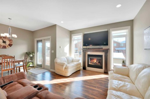 12 Rosse Place, Sylvan Lake, AB - Indoor Photo Showing Living Room With Fireplace