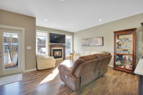 12 Rosse Place, Sylvan Lake, AB - Indoor Photo Showing Living Room With Fireplace