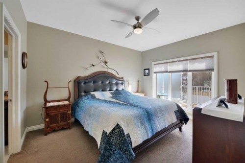 12 Rosse Place, Sylvan Lake, AB - Indoor Photo Showing Bedroom