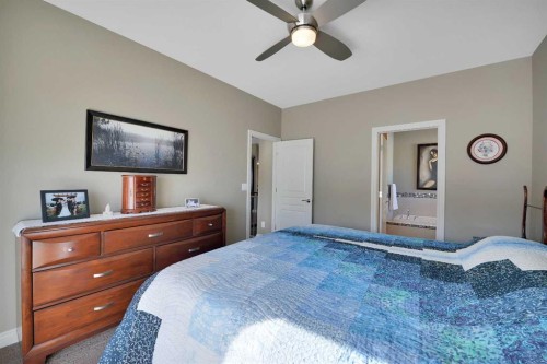 12 Rosse Place, Sylvan Lake, AB - Indoor Photo Showing Bedroom