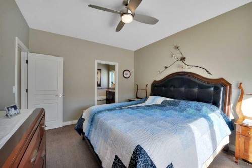 12 Rosse Place, Sylvan Lake, AB - Indoor Photo Showing Bedroom
