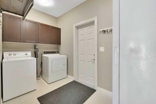 12 Rosse Place, Sylvan Lake, AB - Indoor Photo Showing Laundry Room