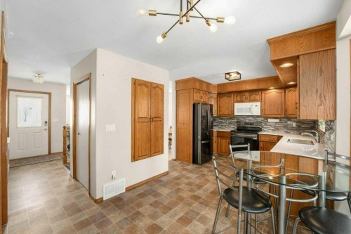 6418 55 Avenue, Ponoka, AB - Indoor Photo Showing Kitchen With Double Sink