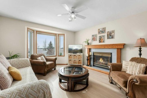6418 55 Avenue, Ponoka, AB - Indoor Photo Showing Living Room With Fireplace
