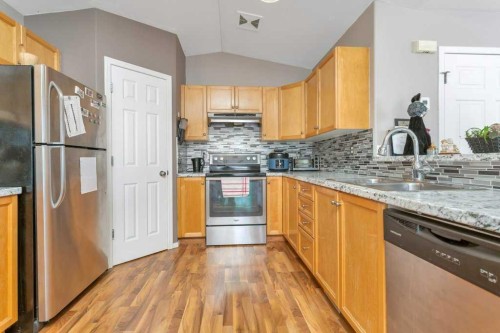 49-103 Addington Drive, Red Deer, AB - Indoor Photo Showing Kitchen With Double Sink