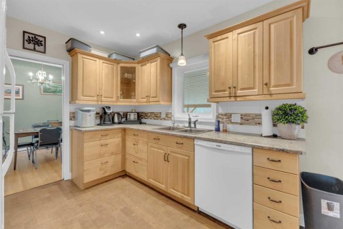602 Partridge Drive, Pelican Point, AB - Indoor Photo Showing Kitchen With Double Sink