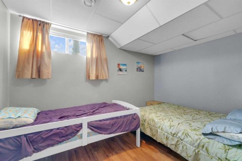 602 Partridge Drive, Pelican Point, AB - Indoor Photo Showing Bedroom