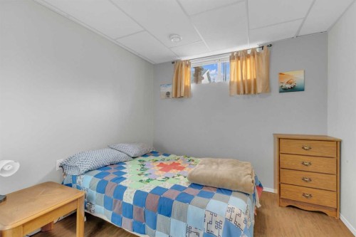 602 Partridge Drive, Pelican Point, AB - Indoor Photo Showing Bedroom