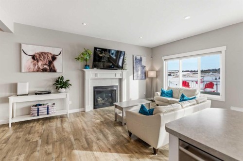 19 Vanveller Way, Sylvan Lake, AB - Indoor Photo Showing Living Room With Fireplace