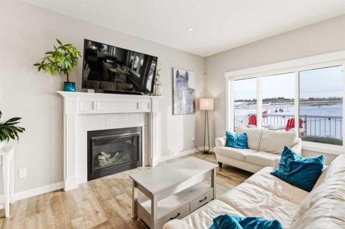 19 Vanveller Way, Sylvan Lake, AB - Indoor Photo Showing Living Room With Fireplace