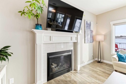 19 Vanveller Way, Sylvan Lake, AB - Indoor Photo Showing Living Room With Fireplace