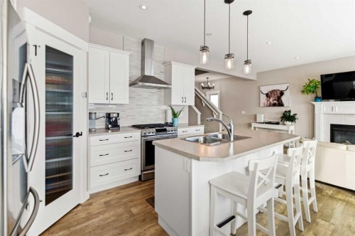 19 Vanveller Way, Sylvan Lake, AB - Indoor Photo Showing Kitchen With Double Sink With Upgraded Kitchen
