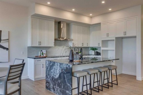56 Dawson Wharf Mount, Chestermere, AB - Indoor Photo Showing Kitchen