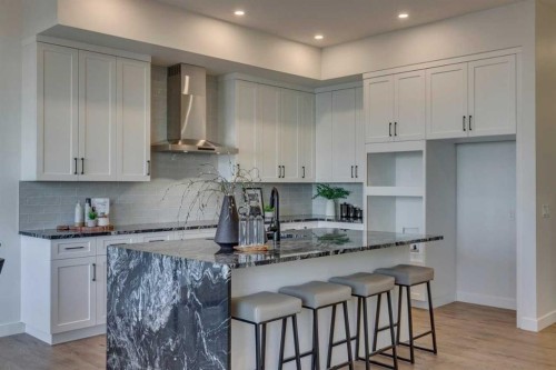 56 Dawson Wharf Mount, Chestermere, AB - Indoor Photo Showing Kitchen