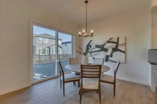 56 Dawson Wharf Mount, Chestermere, AB - Indoor Photo Showing Dining Room
