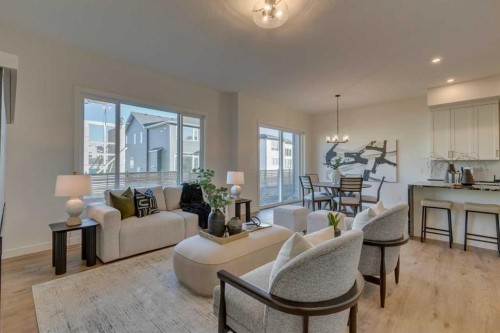 56 Dawson Wharf Mount, Chestermere, AB - Indoor Photo Showing Living Room