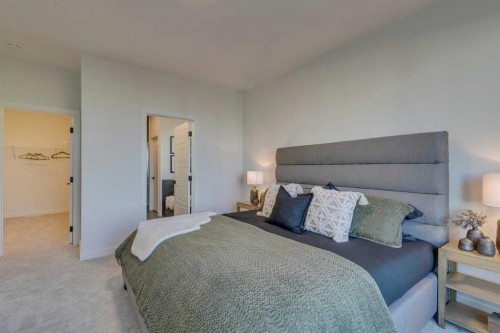 56 Dawson Wharf Mount, Chestermere, AB - Indoor Photo Showing Bedroom