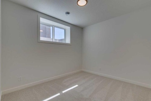 56 Dawson Wharf Mount, Chestermere, AB - Indoor Photo Showing Other Room