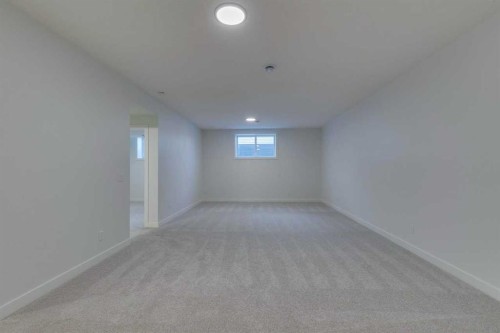 56 Dawson Wharf Mount, Chestermere, AB - Indoor Photo Showing Other Room
