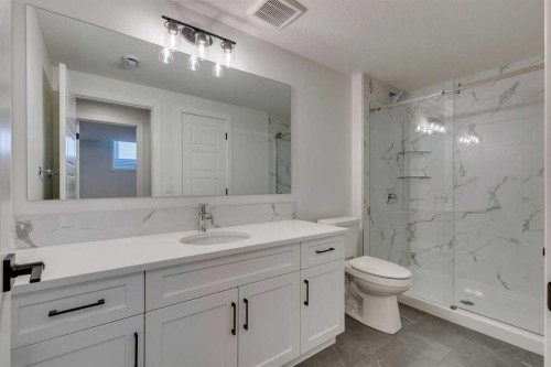 56 Dawson Wharf Mount, Chestermere, AB - Indoor Photo Showing Bathroom