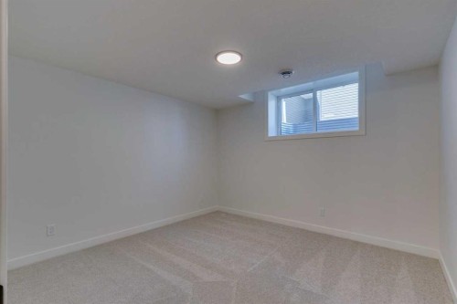 56 Dawson Wharf Mount, Chestermere, AB - Indoor Photo Showing Other Room