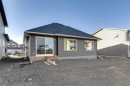 56 Dawson Wharf Mount, Chestermere, AB  - Outdoor With Exterior 