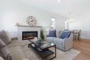 3-5324 49 Avenue, Lacombe, AB  - Indoor Photo Showing Living Room With Fireplace 